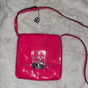 NEON pink Calvin Klein flat crossover !